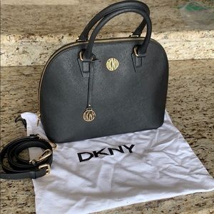 **NEVER USED** DKNY satchel. Black. w/adj strap.